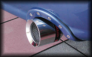 Close Up of New A4 8E USA OEM Bumper Exhaust Collar from UBERH�US in MatchPaint Denim Blue