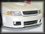 Audi S4 B5 shown with LLTek's RSR Bumper with Optional Large Mesh, Grill, Xenon HID Driving Lights and Carbon Fiber Splitter