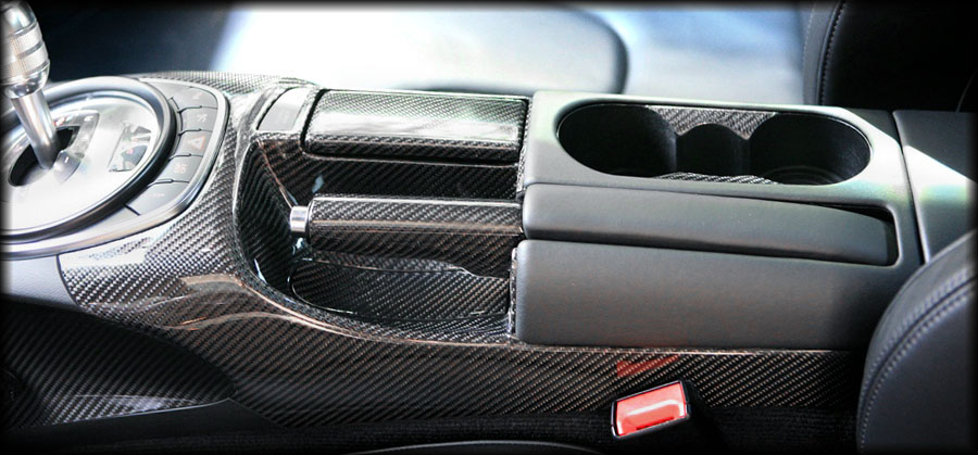 Audi R8 console finished in custom carbon fiber.